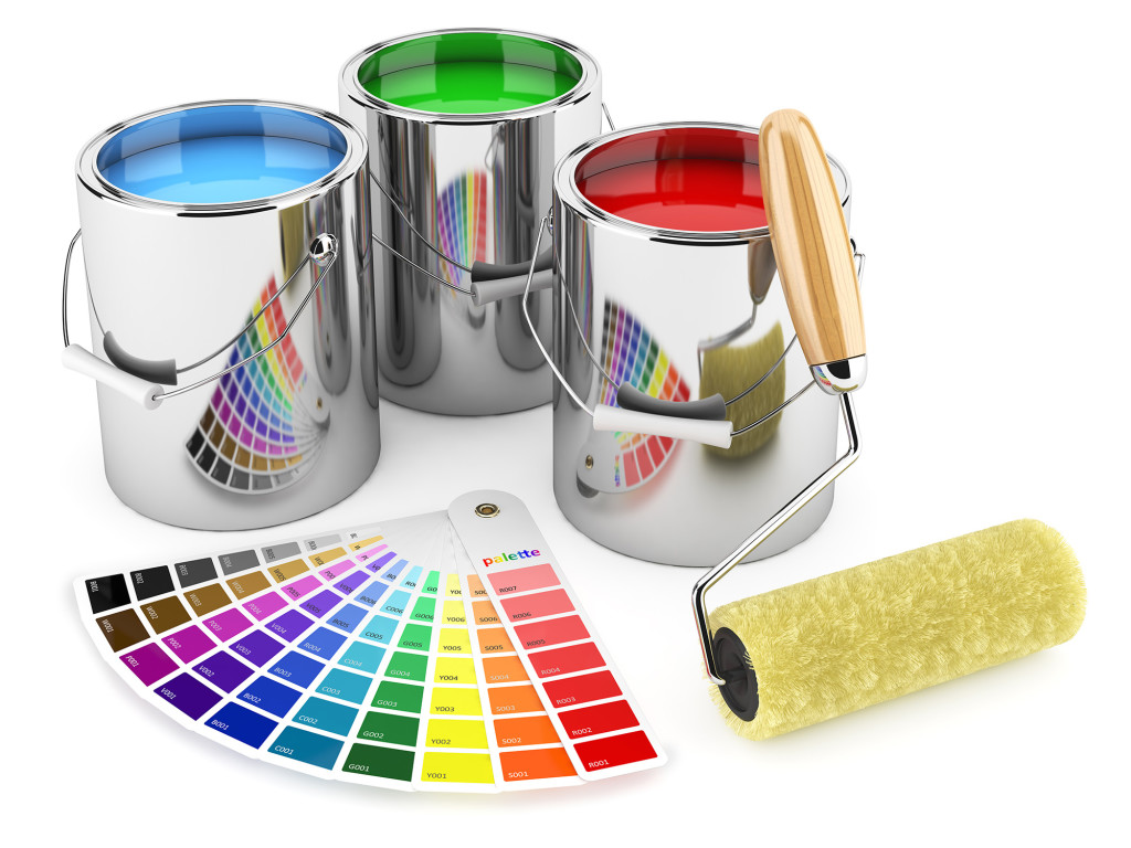 silver paint cans containing ble, green & red paint, paint roller, arrangement of paint sample color strips