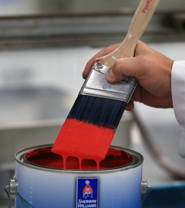 Sherwin Williams Paint Can with Red Paint on Purty Brush